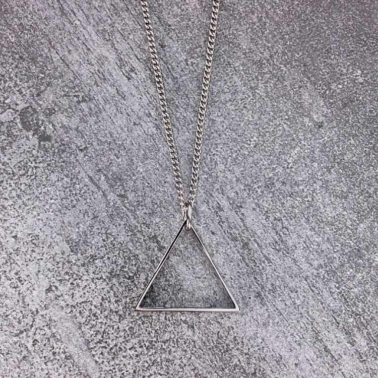 Silver Triangle Necklace - Our Silver Triangle Necklace features our Signature Triangle Pendant and Cuban Link Chain. The Perfect piece for any wardrobe.