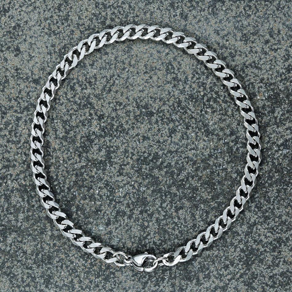 Our Silver Cuban Chain Bracelet features our premium silver cuban chain and signature polished silver plate, engraved with RG&B.