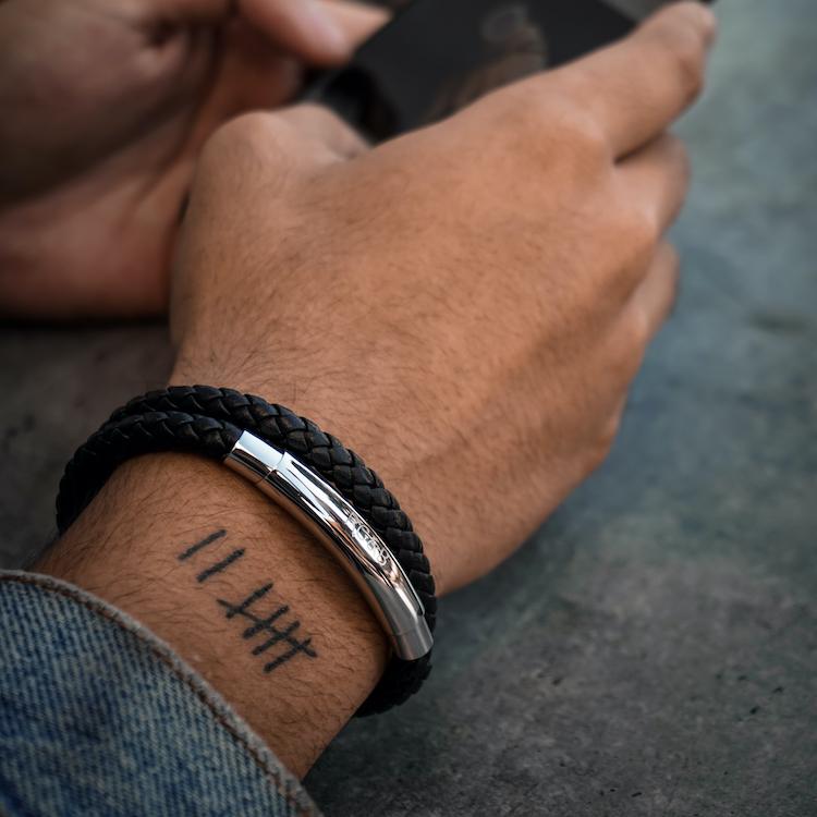 Double Leather Bracelet in Silver & Black - Our Men's Double Leather Bracelet with Black Leather and a Polished Silver Adjustable Clasp Engraved with our Signature RG&B Logo.