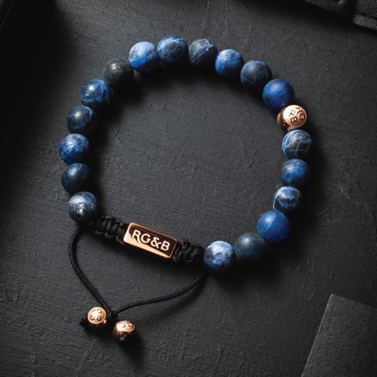 Premium Sodalite Bracelet - Our Premium Sodalite Bead Bracelet Features Natural Stones, Waxed Cord and Polished Rose Gold Steel Hardware. A Beautiful Addition to any Collection.