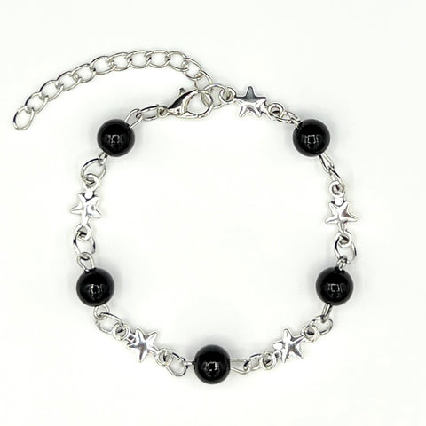 Our Astralis Chain & Bead Bracelet features black onyx beads and a silver star chain design, resulting in a bold silver & black bracelet for men.