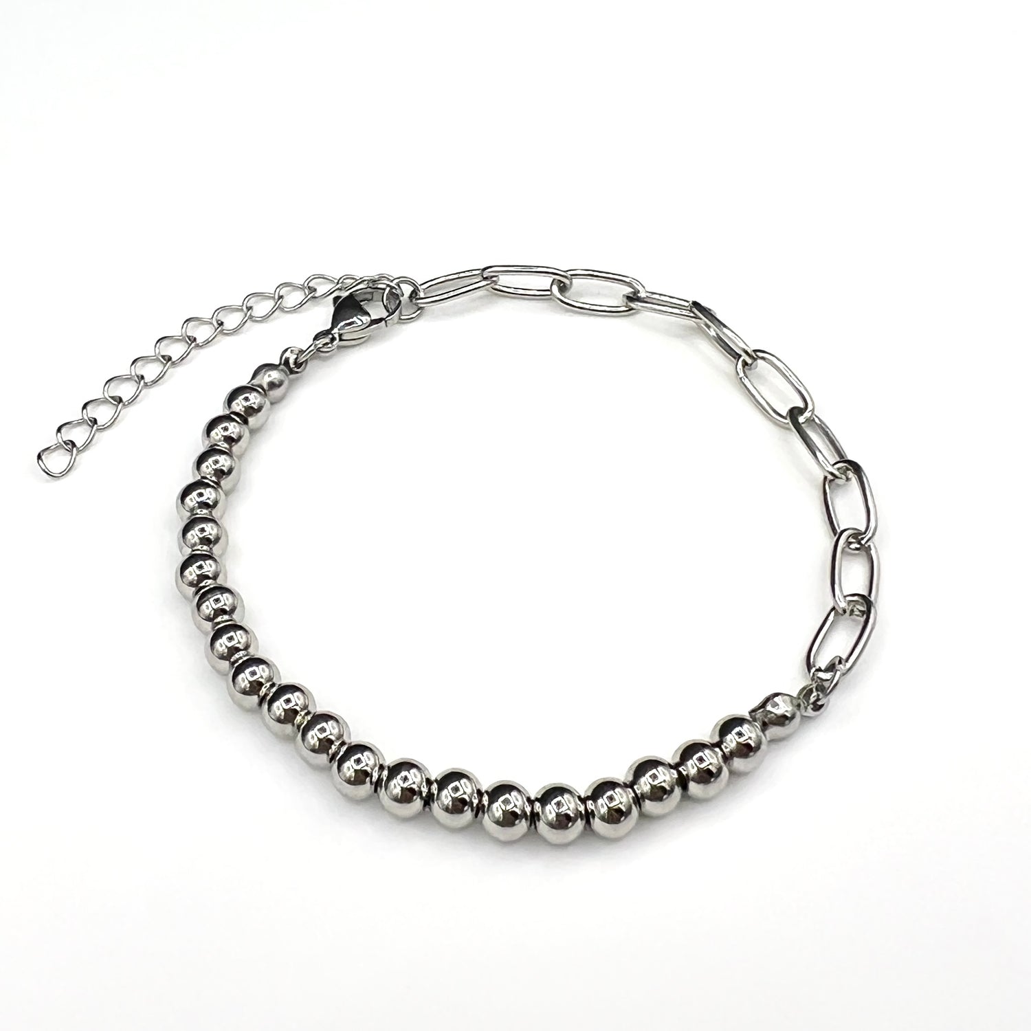 Our Fusion Link Chain Bracelet in Silver for men features polished beads and bold chain links.