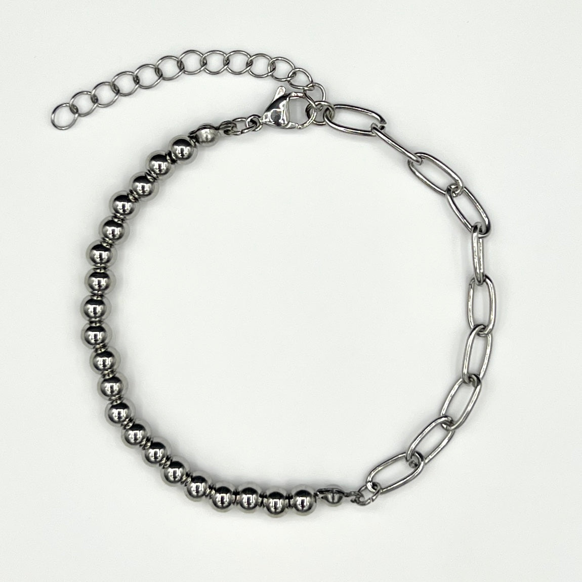 Our Fusion Link Chain Bracelet in Silver for men features polished beads and bold chain links.