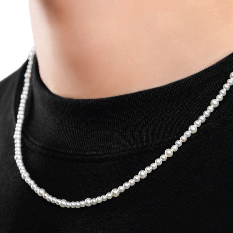 Our Asymmetric Pearl Necklace has been crafted using different sized polished white pearls, along with the finest silver hardware to hold it all together.