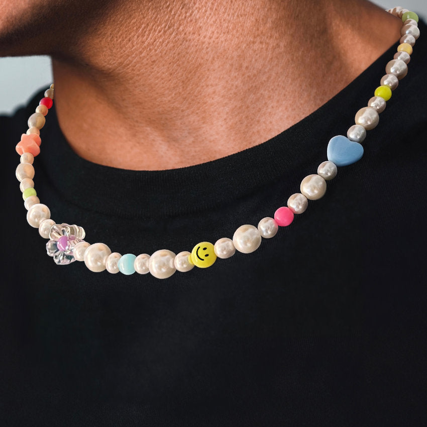 Our Premium Pearl &amp; Bead Necklace has been crafted using white pearls, colored beads and the finest silver hardware to hold it all together.