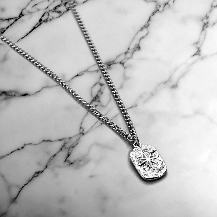 Our Star Pendant Necklace in silver has been crafted with our minimal rectangle pendant and signature cuban chain.