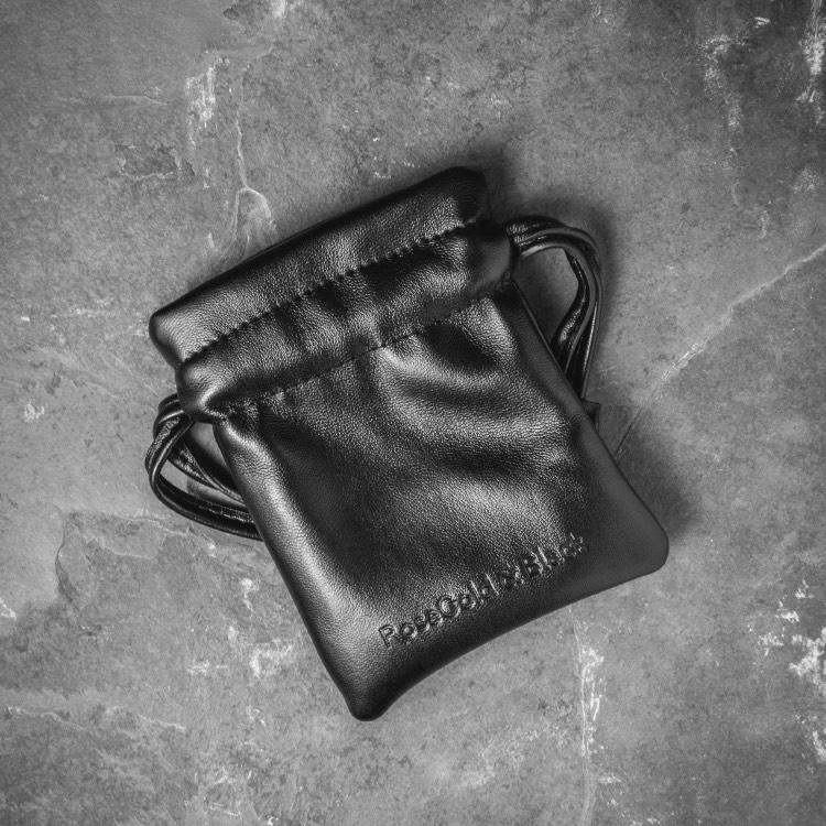 Leather pouch for our Black Woven Leather Bracelet Which Features a Stainless Steel Hook Clasp, Engraved with the Signature RG&B Logo.