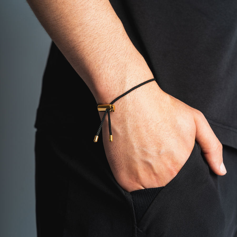 Our Black & Gold Drawstring Bracelet has been crafted using the finest braided maritime grade nylon rope.