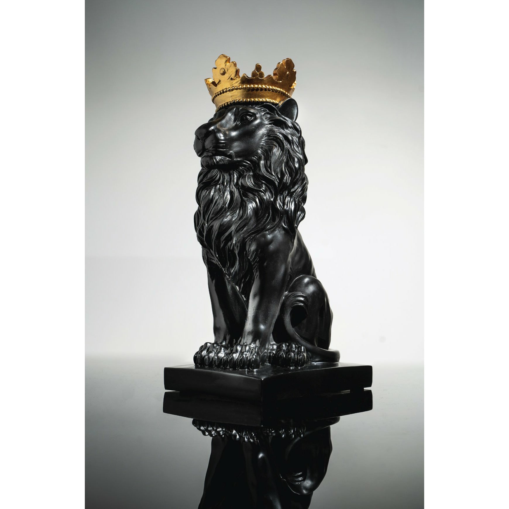 Black Lion Sculpture - Our Black & Gold Lion With Crown Sculpture is the perfect addition to any space.