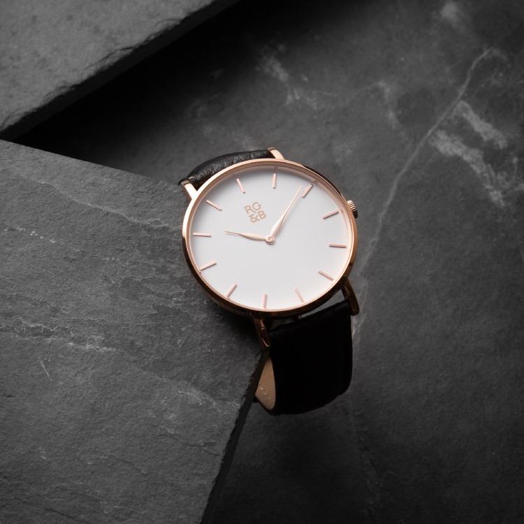 Rose Gold Minimal Watch - Explore our Classic Minimal Watch in Rose Gold & Black. Featuring a Polished Rose Gold Case, Hands & Hour Markers, a White Dial and a Black Leather Strap.