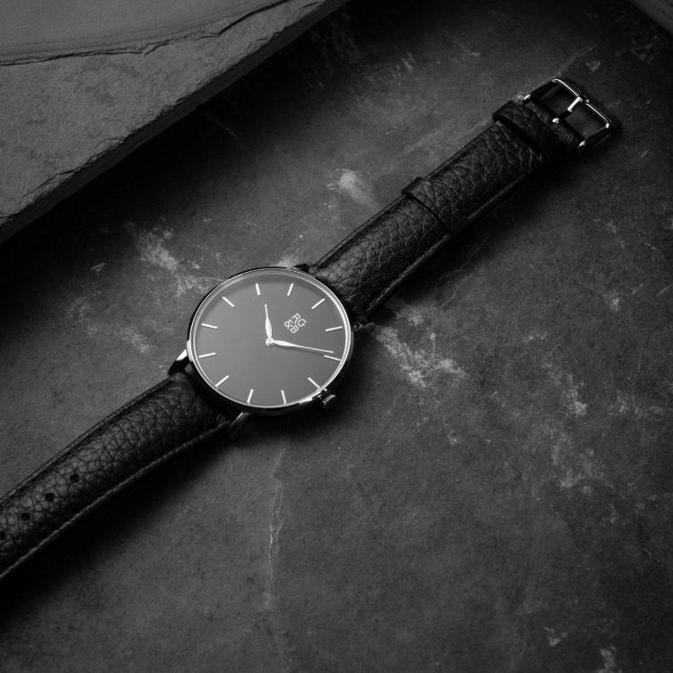 Silver & Black Minimal Watch - Explore our Classic Minimal Watch in Silver & Black. Featuring a Polished Silver Case, Hands & Hour Markers, a Black Dial and a Black Leather Strap.