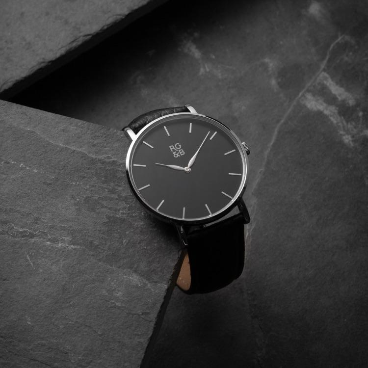 Silver & Black Minimal Watch - Explore our Classic Minimal Watch in Silver & Black. Featuring a Polished Silver Case, Hands & Hour Markers, a Black Dial and a Black Leather Strap.