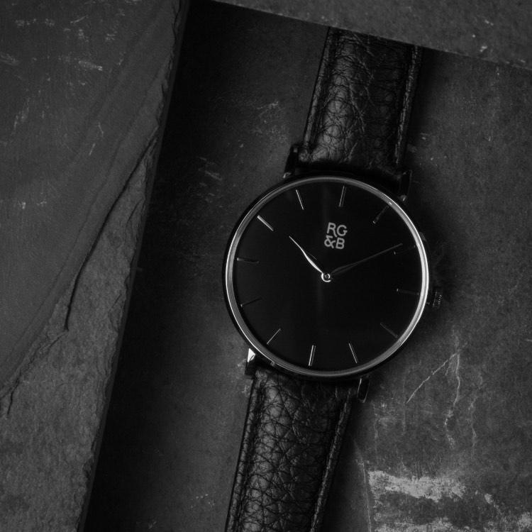 Silver & Black Minimal Watch - Explore our Classic Minimal Watch in Silver & Black. Featuring a Polished Silver Case, Hands & Hour Markers, a Black Dial and a Black Leather Strap.