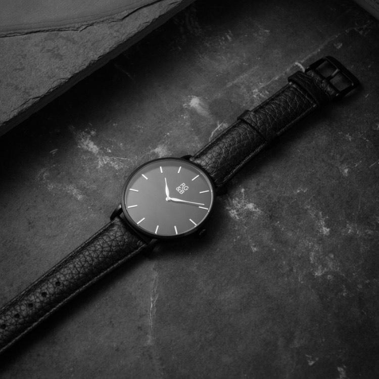 Black Minimal Watch - Explore our Classic Minimal Watch in All Black. Featuring a Brushed Black Case, Gunmetal Hands & Hour Markers, a Black Dial and a Black Leather Strap.