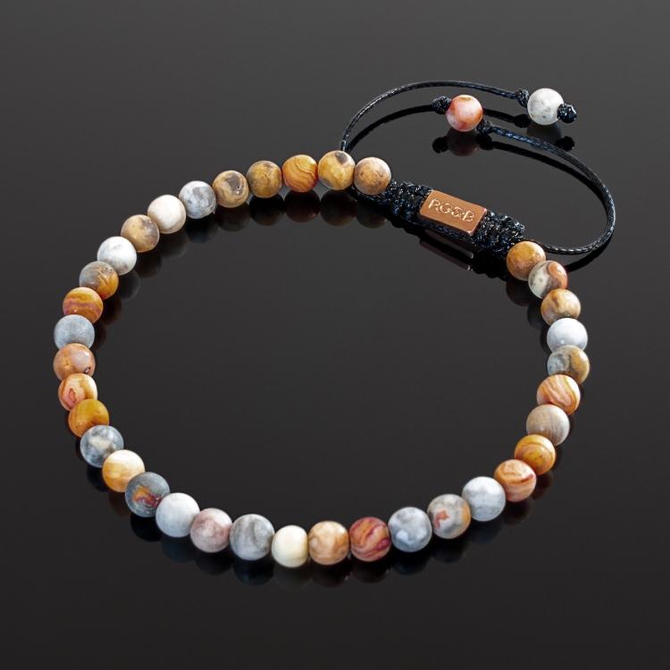 Our Crazy Lace Agate Bead Bracelet Features Natural Stones, Waxed Cord and Brushed Rose Gold Steel Hardware. A Beautiful Addition to any Collection.