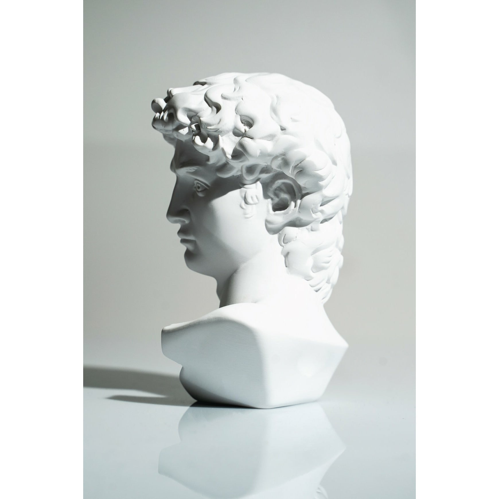 White David Bust Sculpture - Our White David Bust Sculpture is a timeless piece that’s an icon of both Italian and World Art History.