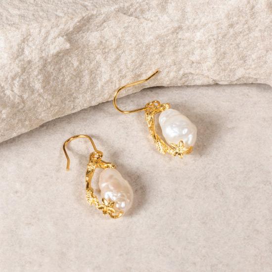 Women's Pearl Earrings - Fine wire hook earring featuring a uniquely molded Flower combined with a precious rough pearl to form a timelessly beautiful pendant. Fine brass, plated with gold or rose gold.