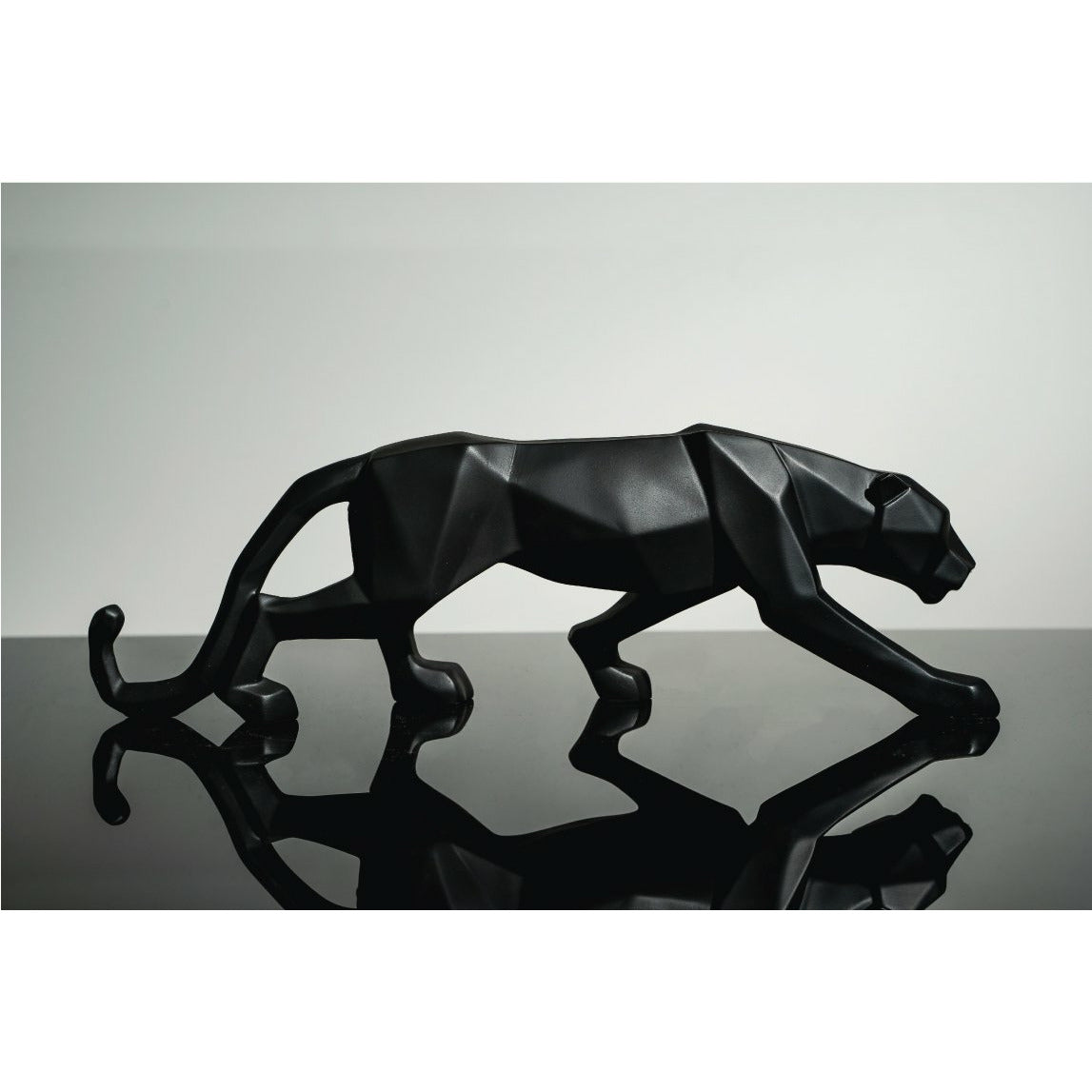 Black Leopard Sculpture - Our Black Leopard Sculpture is the perfect addition to any space. Also available in White.