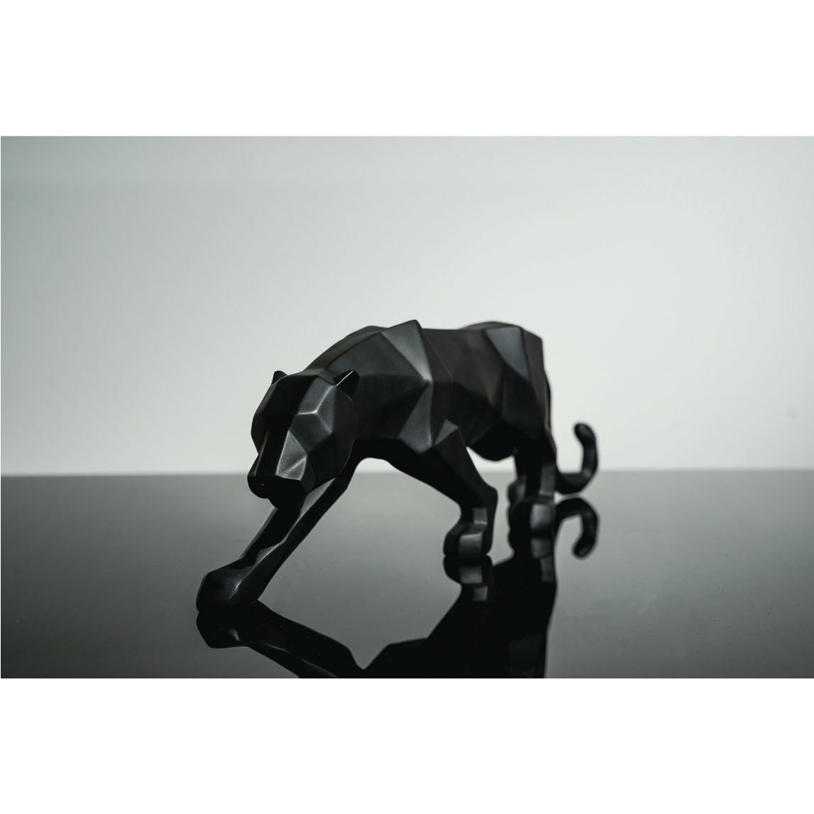 Black Leopard Sculpture - Our Black Leopard Sculpture is the perfect addition to any space. Also available in White.