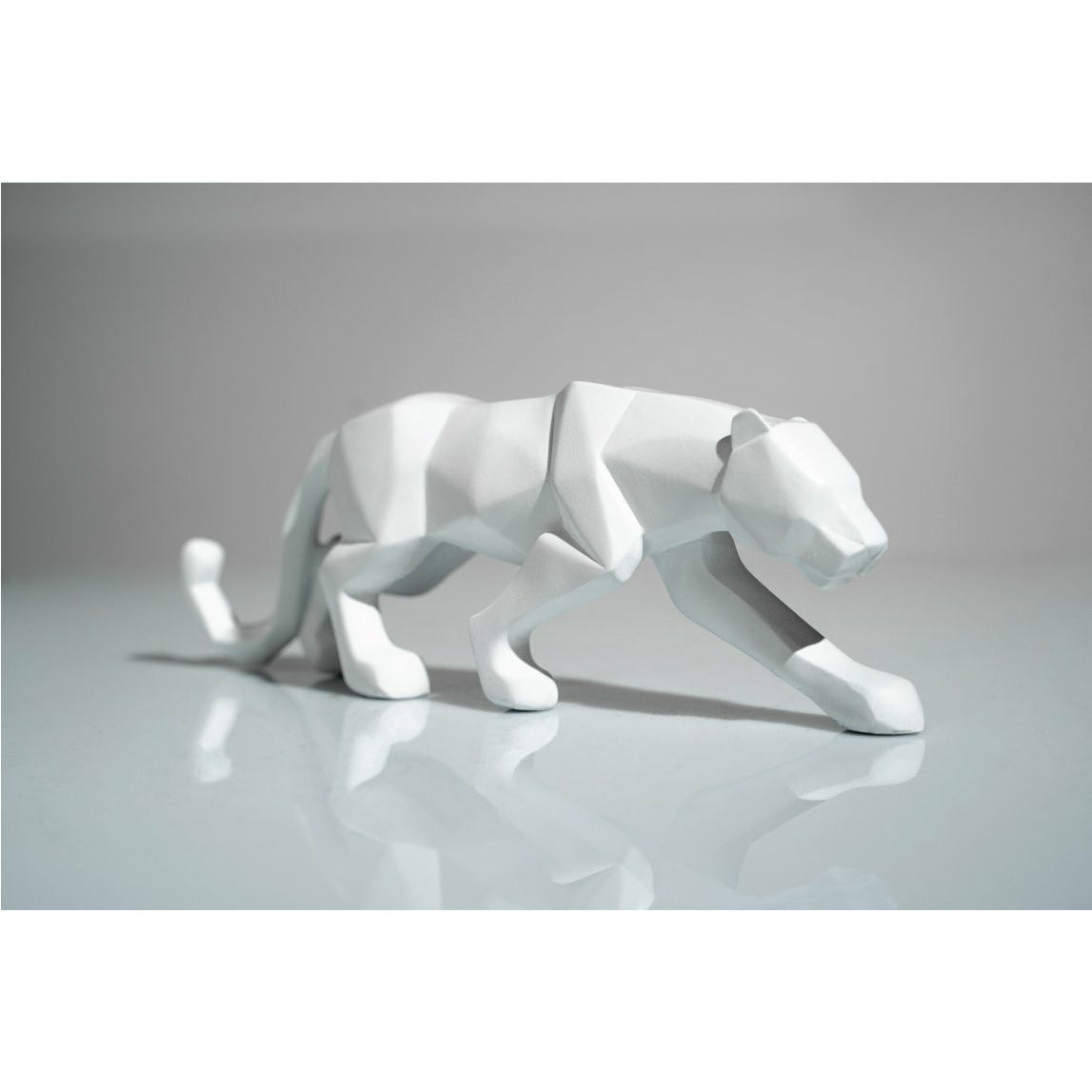 White Leopard Sculpture - Our White Leopard Sculpture is the perfect addition to any space. Also available in Black.