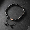 Minimal Lava Stone Bead Bracelet - Our Minimal Lava Stone Bead Bracelet Features Natural Stones, Waxed Cord and Brushed Rose Gold Steel Hardware. A Beautiful Addition to any Collection.