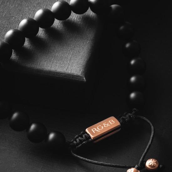 Matte Black Bracelet - Our Matte Black Bead Bracelet Features Natural Stones, Waxed Cord and Brushed Rose Gold Steel Hardware. A Beautiful Addition to any Collection.