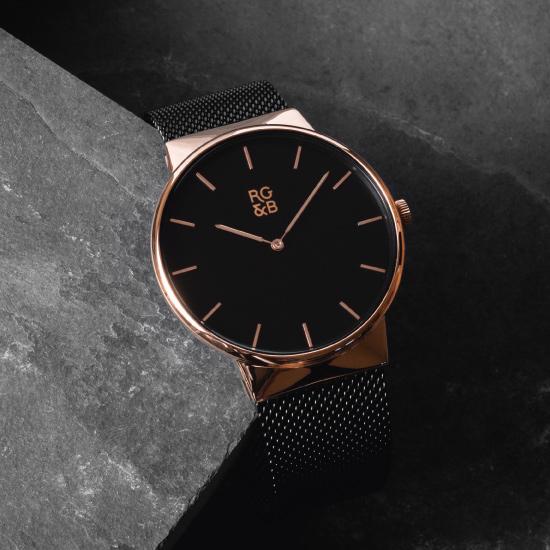 Minimal Rose Gold & Black Watch - Our Minimal Rose Gold & Black Watch features a Polished Rose Gold Case, Black Dial & Strap, Rose Gold Hands and Hour Markers Along with our Signature Logo.