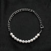 Our Pearl & Silver Figaro Chain Bracelet has been crafted using both polished white pearls and silver figaro chain.