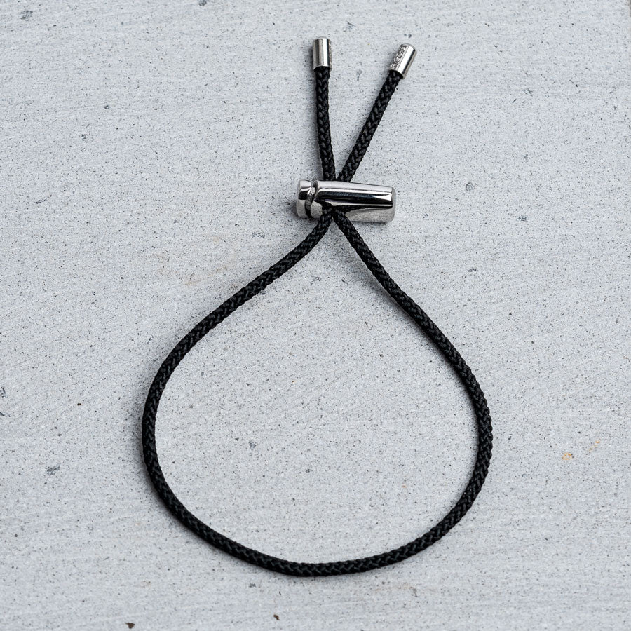 Our Silver & Black Drawstring Bracelet has been crafted using the finest braided maritime grade nylon rope.