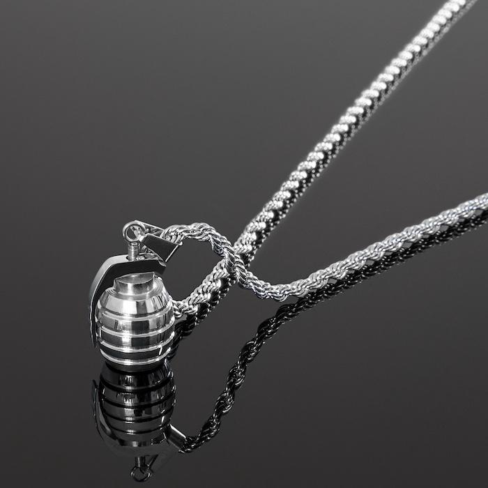 Our Signature Grenade Necklace in Silver. Featuring a Grenade Pendant and Rope Chain in Polished Silver. Visit us live now!