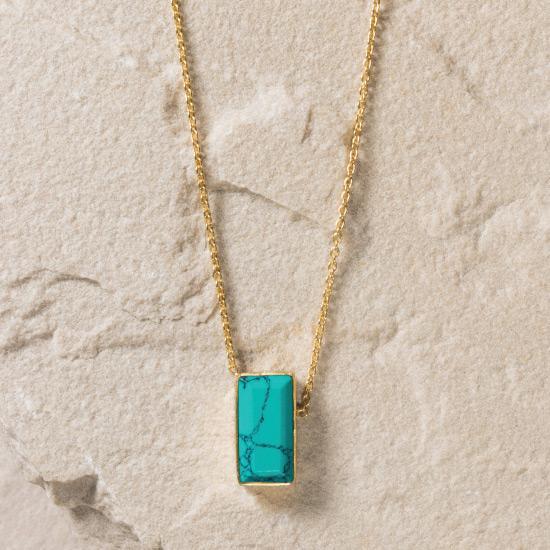 Turquoise Necklace - Finely handcrafted gold chain necklace that flows naturally into a Turquoise gemstone.