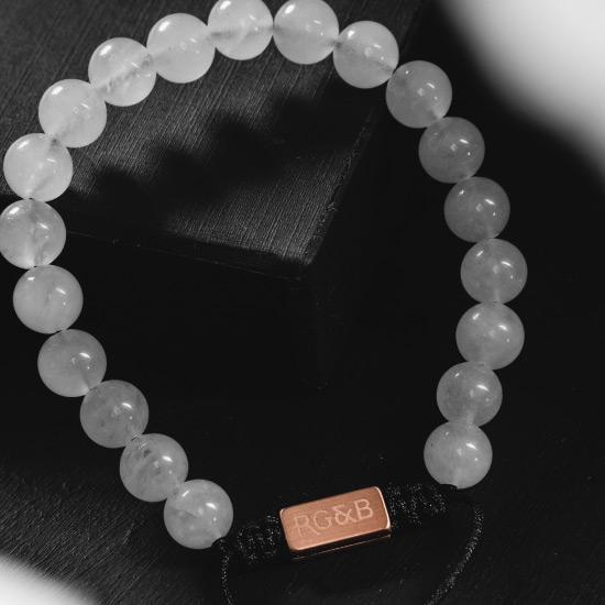 White Jade Bracelet - Our White Jade Bead Bracelet Features Natural Stones, Waxed Cord and Brushed Rose Gold Steel Hardware. A Beautiful Addition to any Collection.