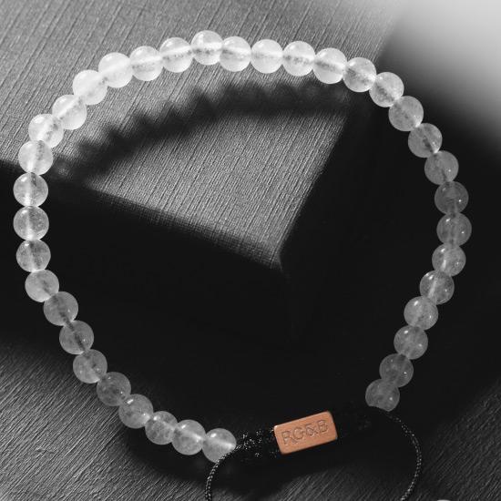 Minimal White Jade Bead Bracelet - Our Minimal White Jade Bead Bracelet Features Natural Stones, Waxed Cord and Brushed Rose Gold Steel Hardware. A Beautiful Addition to any Collection.